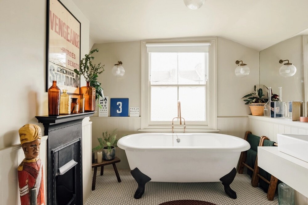 A Colorful Family Home in London 11 bathroom clawfoot bath fireplace nordroom A Colorful Family Home in London