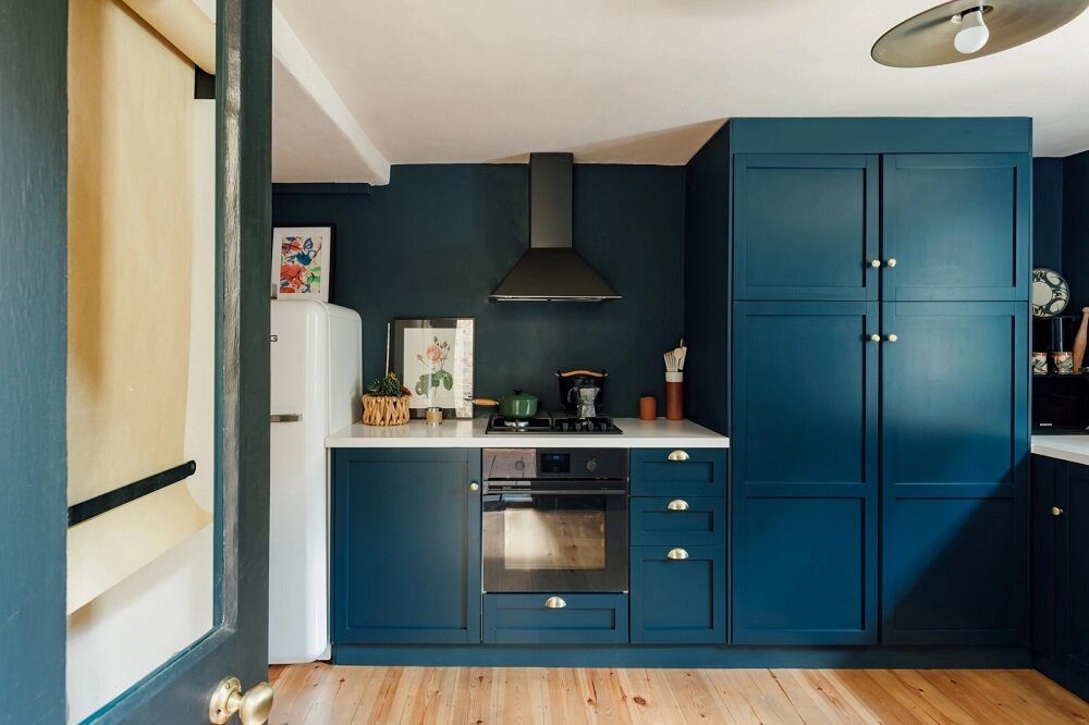 A Colorful Family Home in London 6 blue-kitchen-cabinets-walls-nordroom