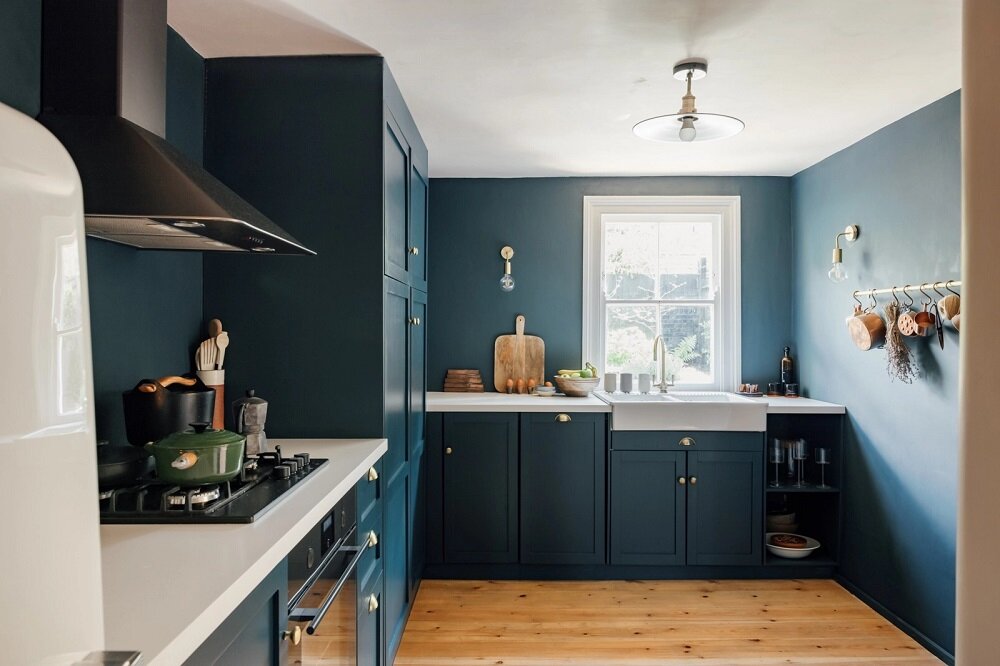 A Colorful Family Home in London 5 blue-kitchen-cabinets-walls-nordroom