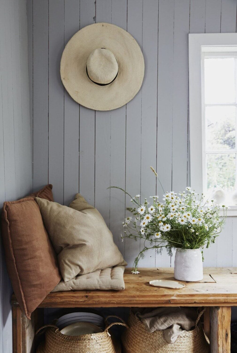 A Small Farmhouse-Style Cottage on a Swedish Allotment 5 built-in-wooden-bench-storage-farmhouse-cottage-recycled-nordroom