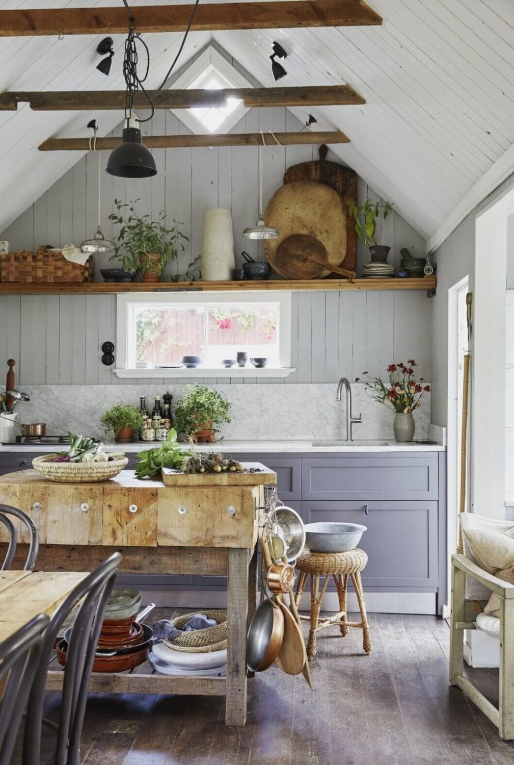 A Small Farmhouse-Style Cottage on a Swedish Allotment 3 farmhouse-cottage-kitchen-carrara-marble-slavaged-wood-recycled-nordroom
