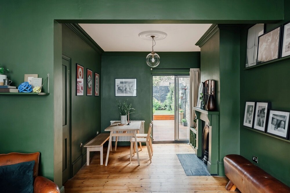 A Colorful Family Home in London 2 green-living-room-fireplace-london-nordroom