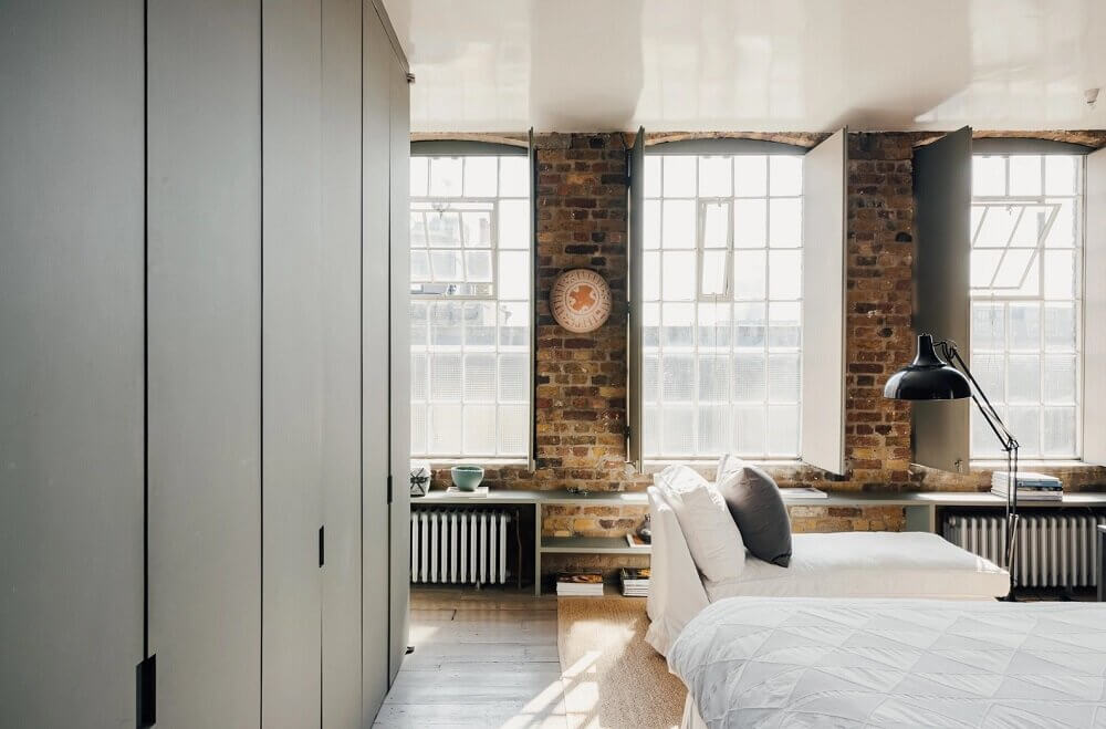 A London Loft Designed By Ilse Crawford And Vincent van Duysen 15 london-loft-ilse-crawford-vincent-van-duysen-grey-bookshelves-kitchen-island--zellige-tiles-brick-wall-victorian-warehouse-conversion-nordroom