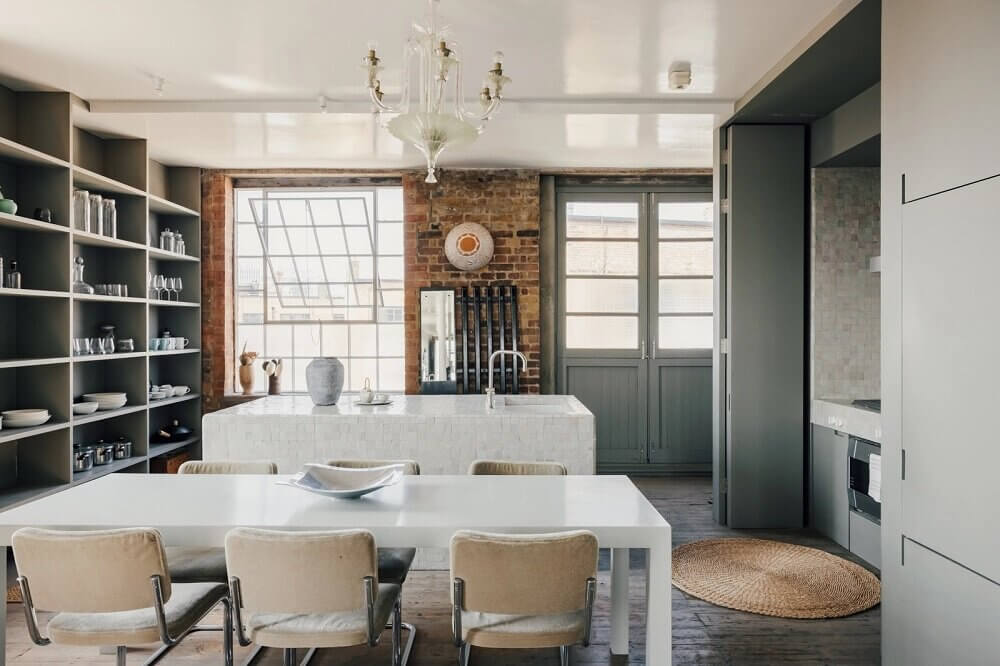A London Loft Designed By Ilse Crawford And Vincent van Duysen 6 london-loft-ilse-crawford-vincent-van-duysen-grey-bookshelves-hammock-nordroom