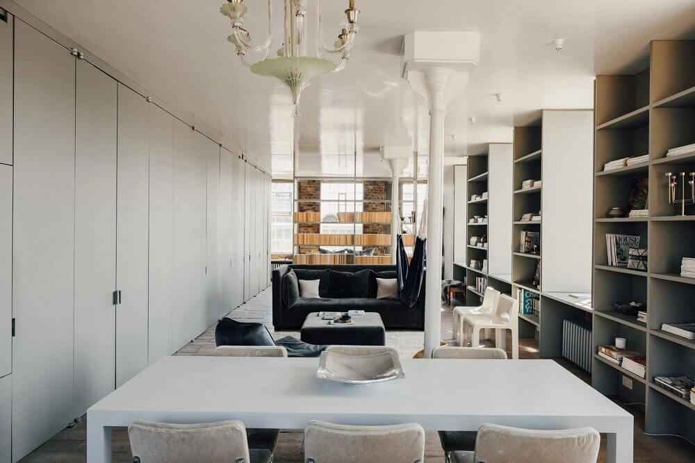 A London Loft Designed By Ilse Crawford And Vincent van Duysen 11 london-loft-ilse-crawford-vincent-van-duysen-grey-bookshelves-kitchen-island--zellige-tiles-brick-wall-victorian-warehouse-conversion-nordroom