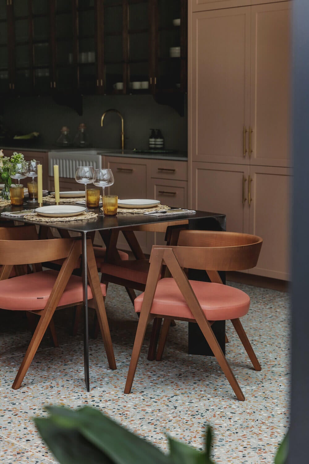 31 Practical Kitchen Flooring Ideas For Your Home 13 pink-kitchen-terrazzo-floor-midcentury-dining-chair-london-studio-duggan-nordroom