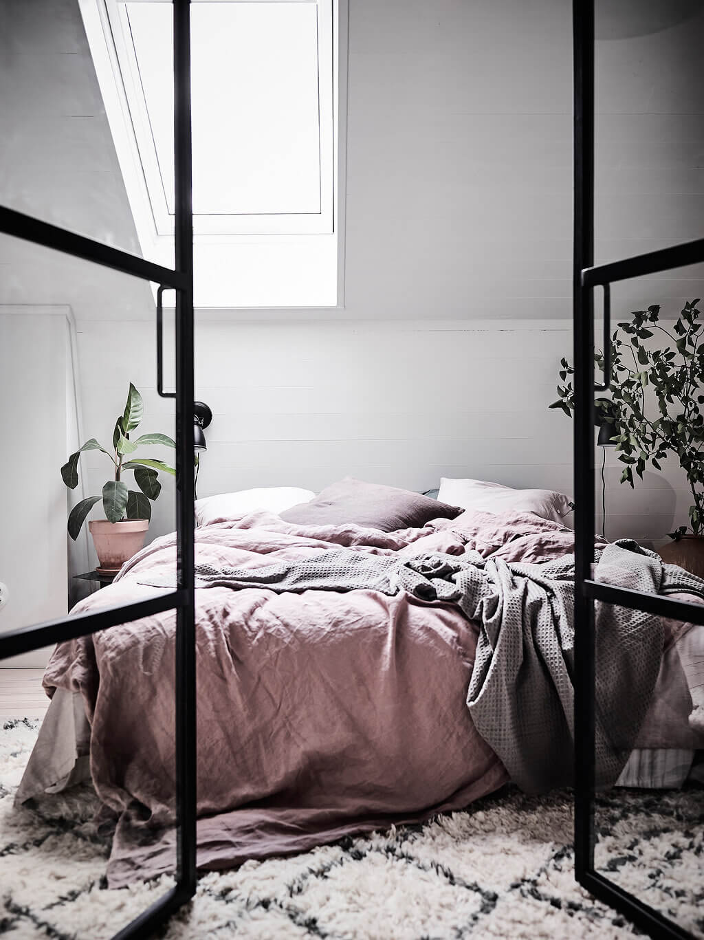 How To Style A Pink Bedroom (For Adults) 49 pink-scandinavian-bedroom-industrial-glass-doors