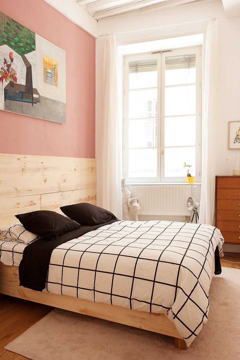 How To Style A Pink Bedroom (For Adults) 37 pink-wall-light-wooden-bedframe