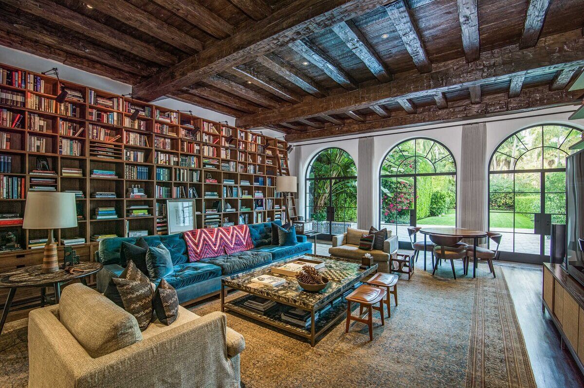 A 1930s Mediterranean-Style Estate in Santa Monica 1 rustic living room bookshelves spanish ceiling santa monica nordroom A 1930s Mediterranean-Style Estate in Santa Monica