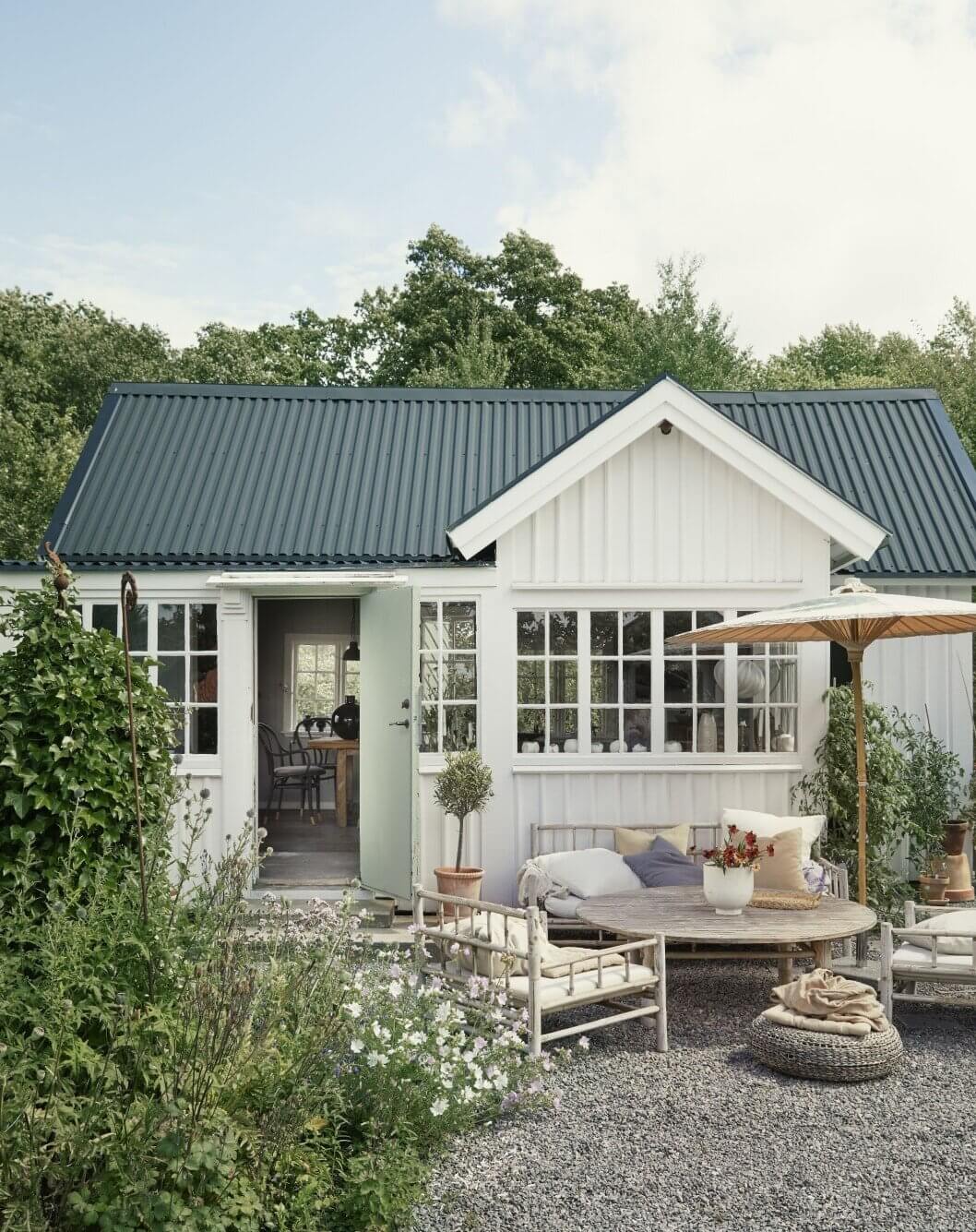 A Small Farmhouse-Style Cottage on a Swedish Allotment 1 small-cottage-farmhouse-allotment-garden-recycled-nordroom