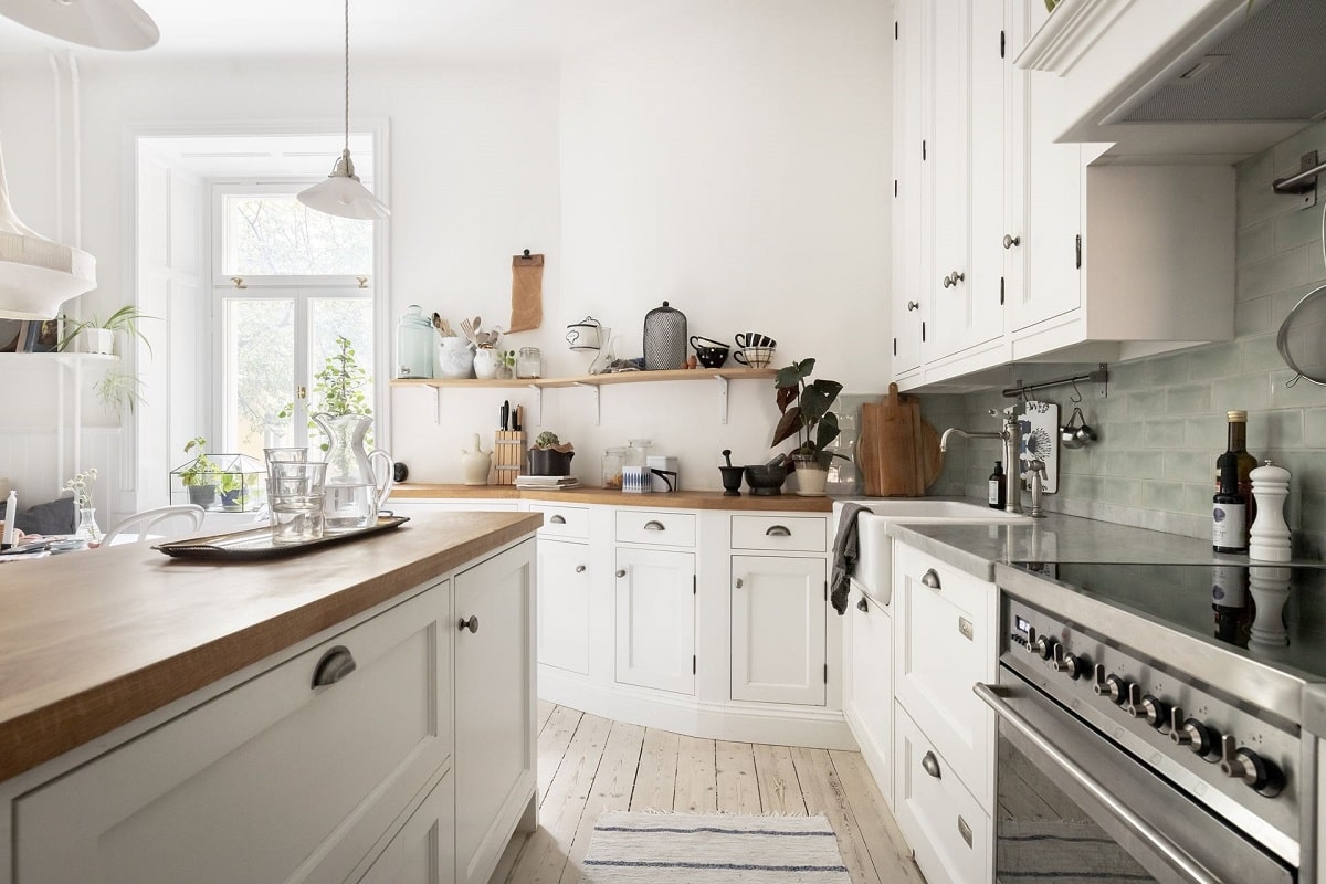 A Bright and Natural Scandinavian Apartment 17 white-kitchen-window-seat-bright-natural-scandinavian-apartment-period-details-nordroom