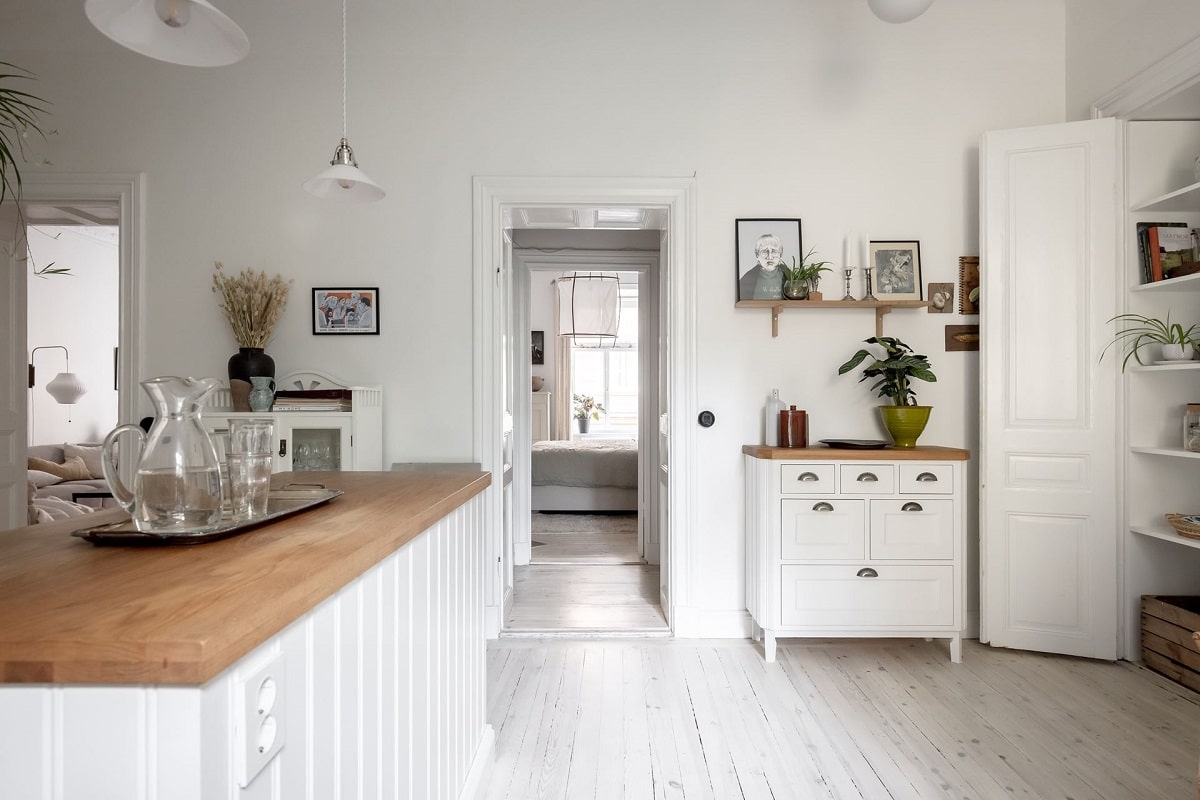 A Bright and Natural Scandinavian Apartment 19 white-kitchen-window-seat-bright-natural-scandinavian-apartment-period-details-nordroom