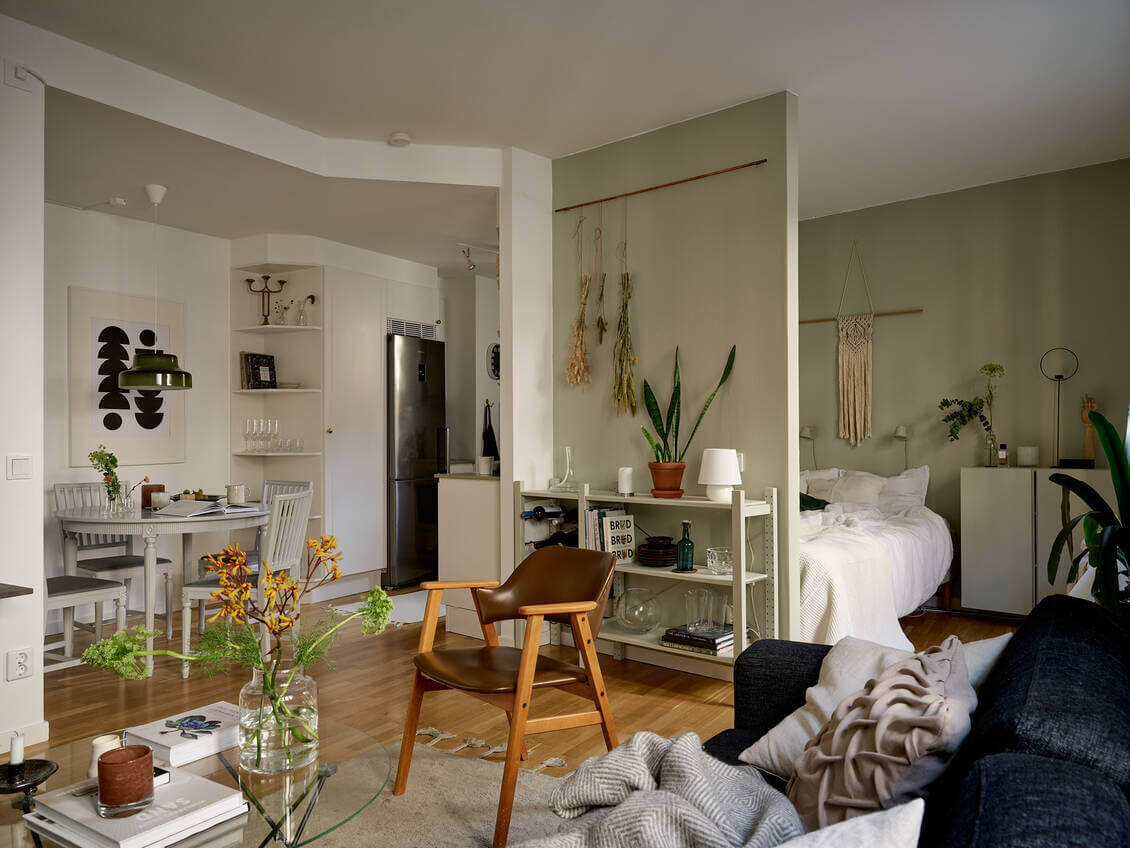 Great Living Room Bedroom Combo Ideas (Layout Tips + Styling) 22 cozy-studio-apartment-sweden-nordroom