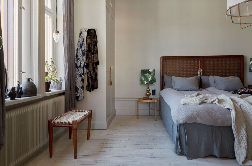 A Light and Charming Scandinavian Apartment 9 scandinavian-bedroom-cane-headboard-nordroom