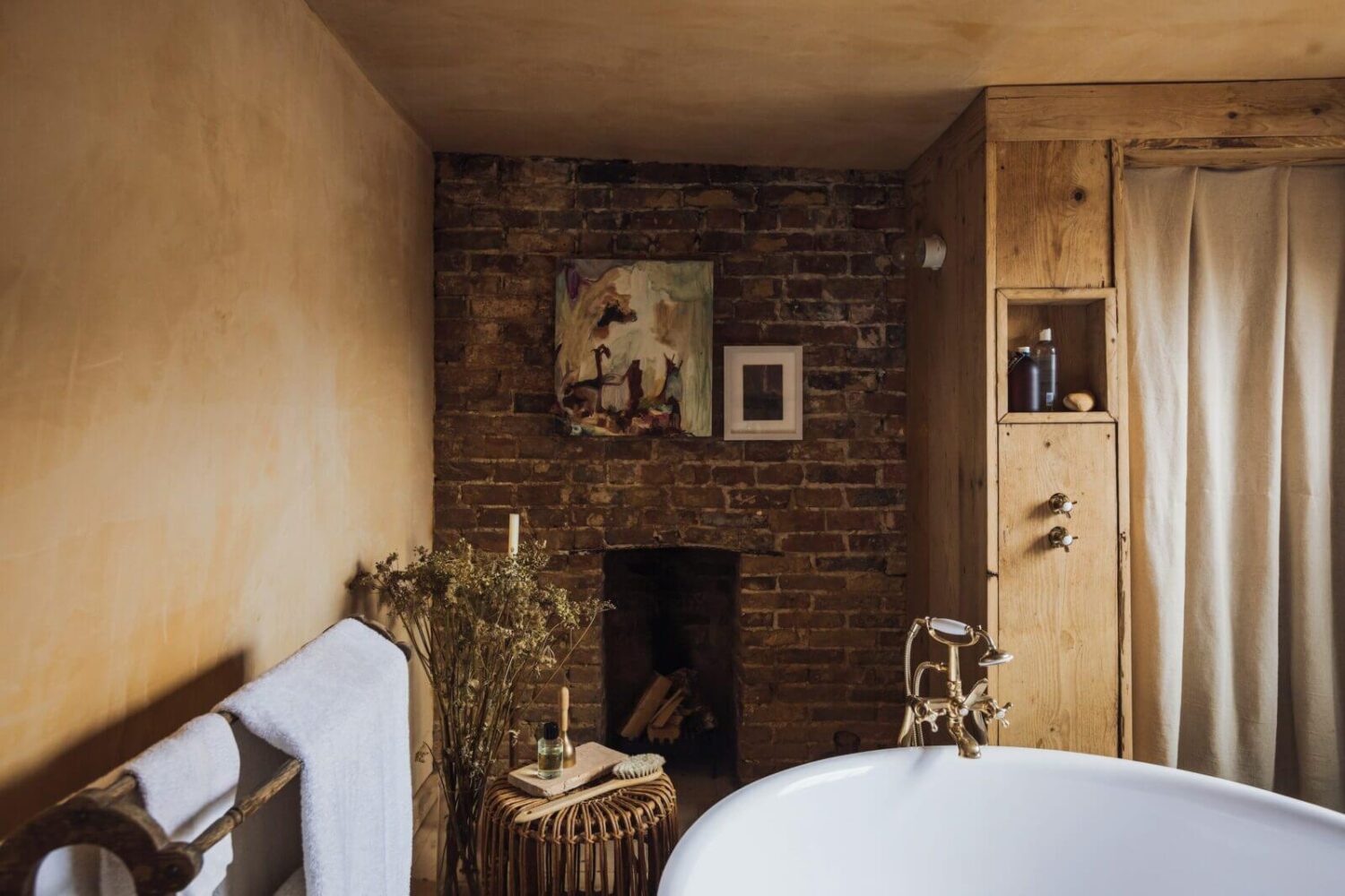 Moody Colors in a Unique Historic Apartment 18 bathroom exposed brick wall nordroom Moody Colors in a Unique Historic Apartment
