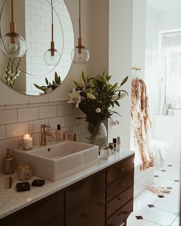 A Warm Scandinavian-Inspired Home in Poland 23 bathroom-natural-light-round-mirror-nordroom