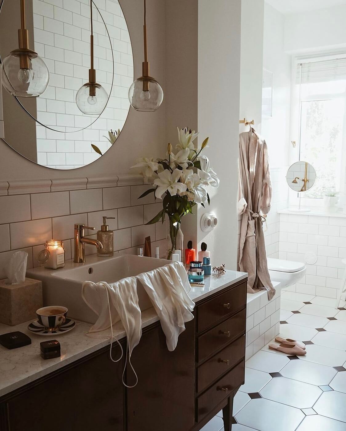 A Warm Scandinavian-Inspired Home in Poland 21 bathroom-wooden-cabinet-round-mirror-nordroom
