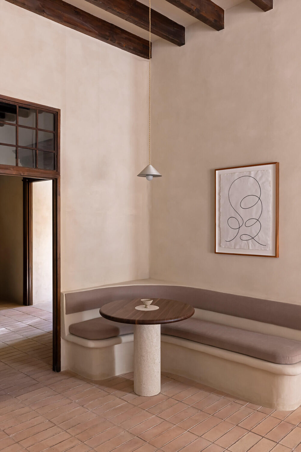A Renovated Historic Townhouse on Mallorca 4 built-in-dining-nook-townhouse-majorca-nordroom