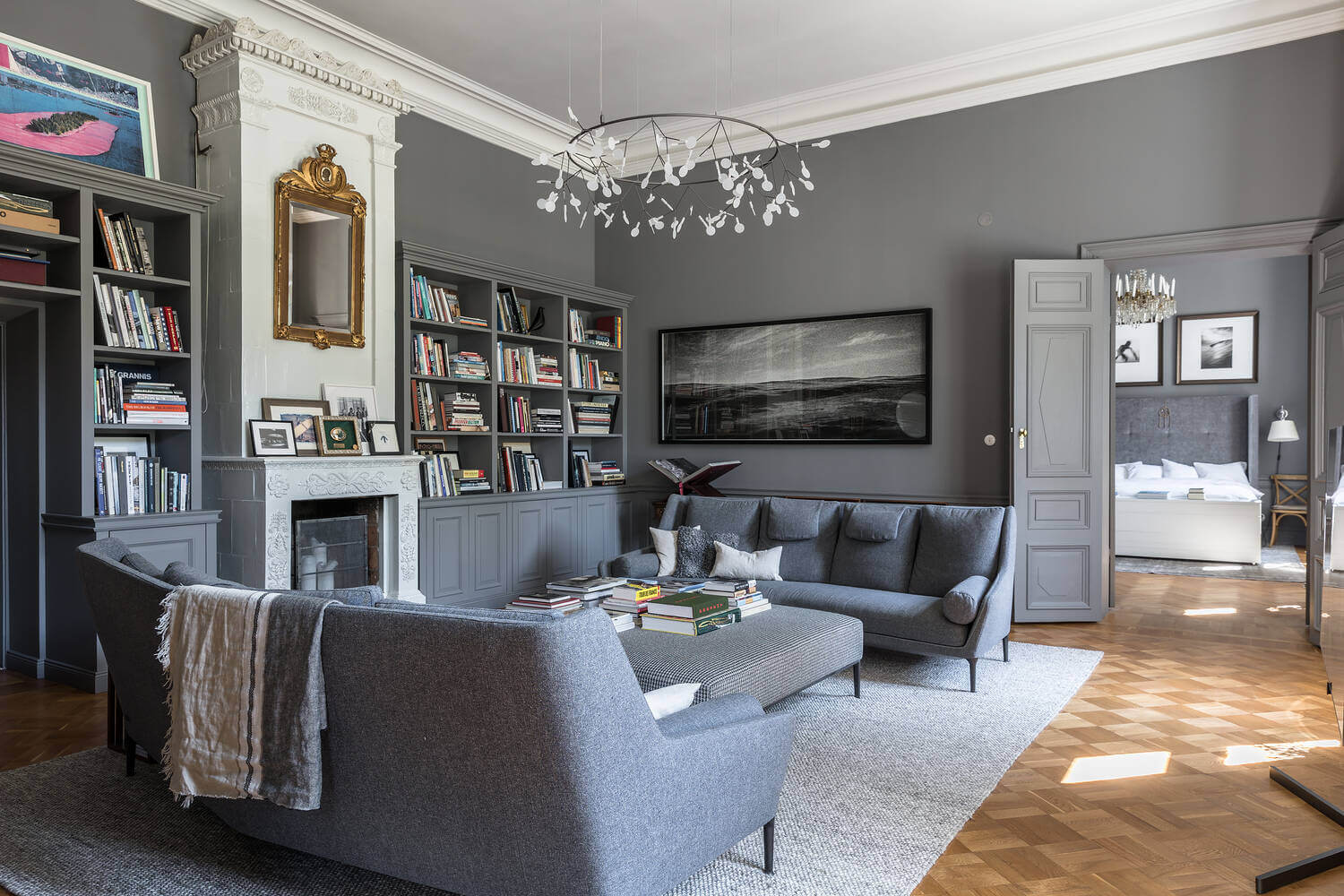 A Stylish Gray Apartment in a Swedish Castle 3 gray-living-room-fireplace-swedish-apartment-nordroom