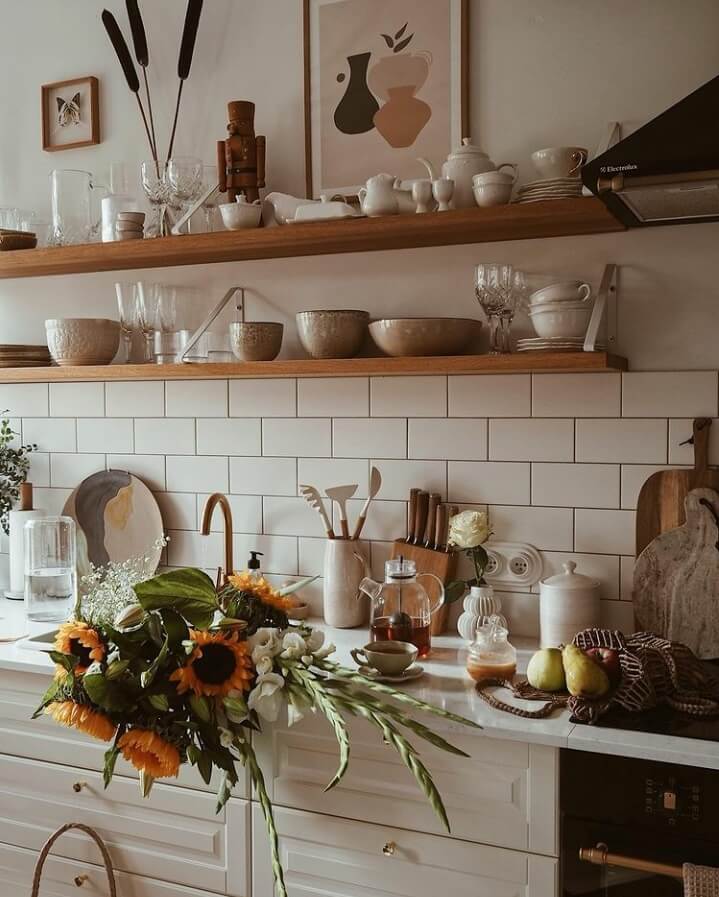 A Warm Scandinavian-Inspired Home in Poland 10 kitchen-open-shelves-flowers-nordroom
