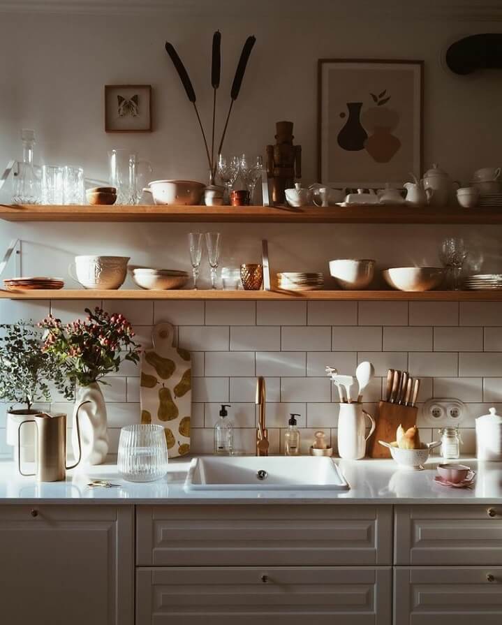 A Warm Scandinavian-Inspired Home in Poland 12 kitchen-shelves-natural-light-nordroom