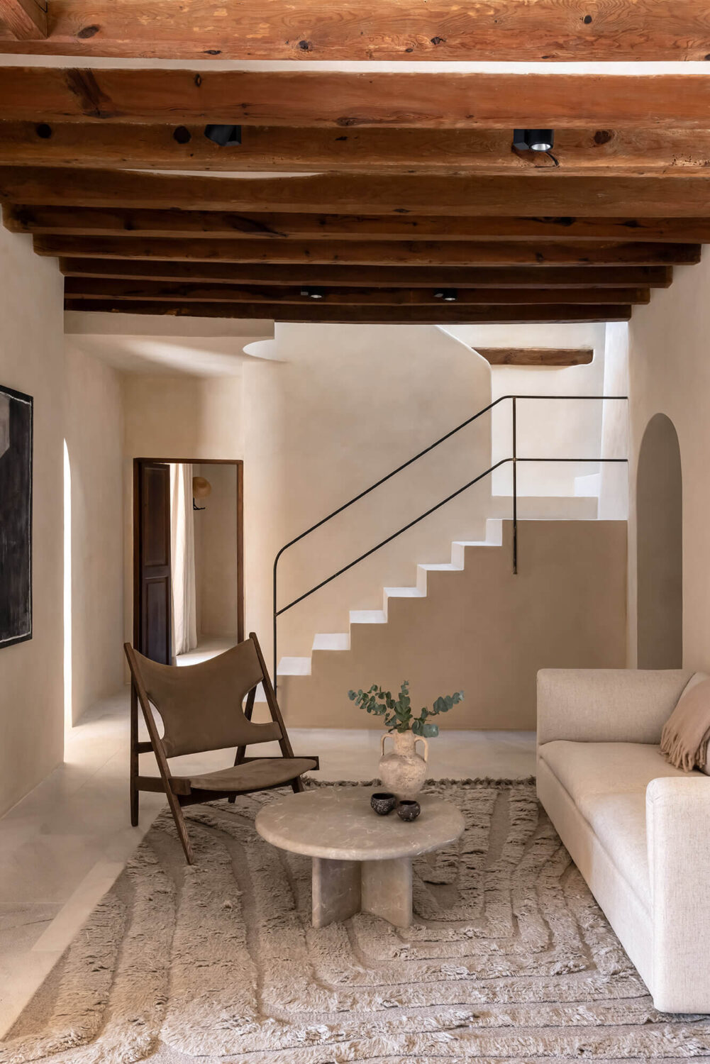 A Renovated Historic Townhouse on Mallorca 11 living-room-exposed-beams-historic-townhouse-majorca-nordroom