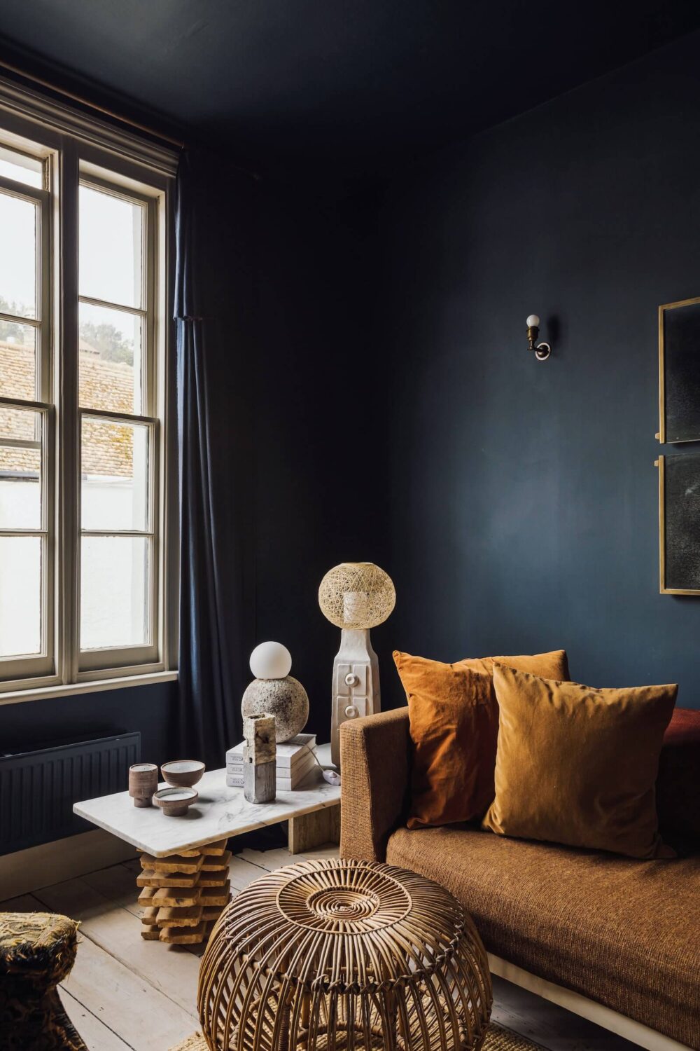 Moody Colors in a Unique Historic Apartment 2 moody blue sitting room mustard sofa nordroom Moody Colors in a Unique Historic Apartment