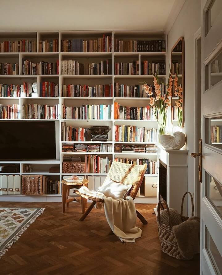 A Warm Scandinavian-Inspired Home in Poland 3 reading-nook-fireplace-natural-light-warm-apartment-nordroom