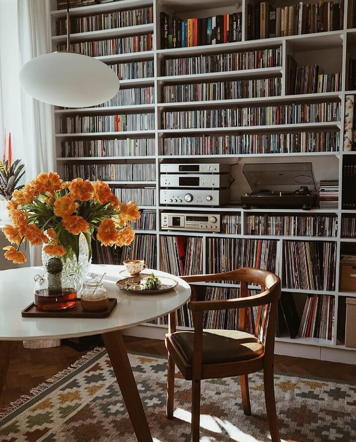 A Warm Scandinavian-Inspired Home in Poland 6 round-table-music-corner-warm-apartment-poland-nordroom