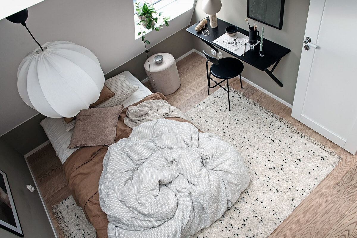 A Tiny but Light Attic Apartment in Sweden 13 scandinavian-bedroom-attic-apartment-nordroom