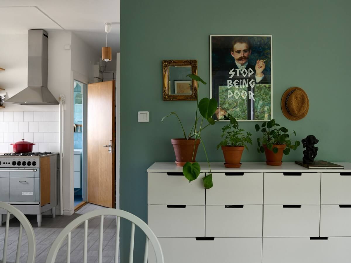 A Natural Scandi Boho Apartment 7 scandinavian-living-room-blue-green-walls-nordroom