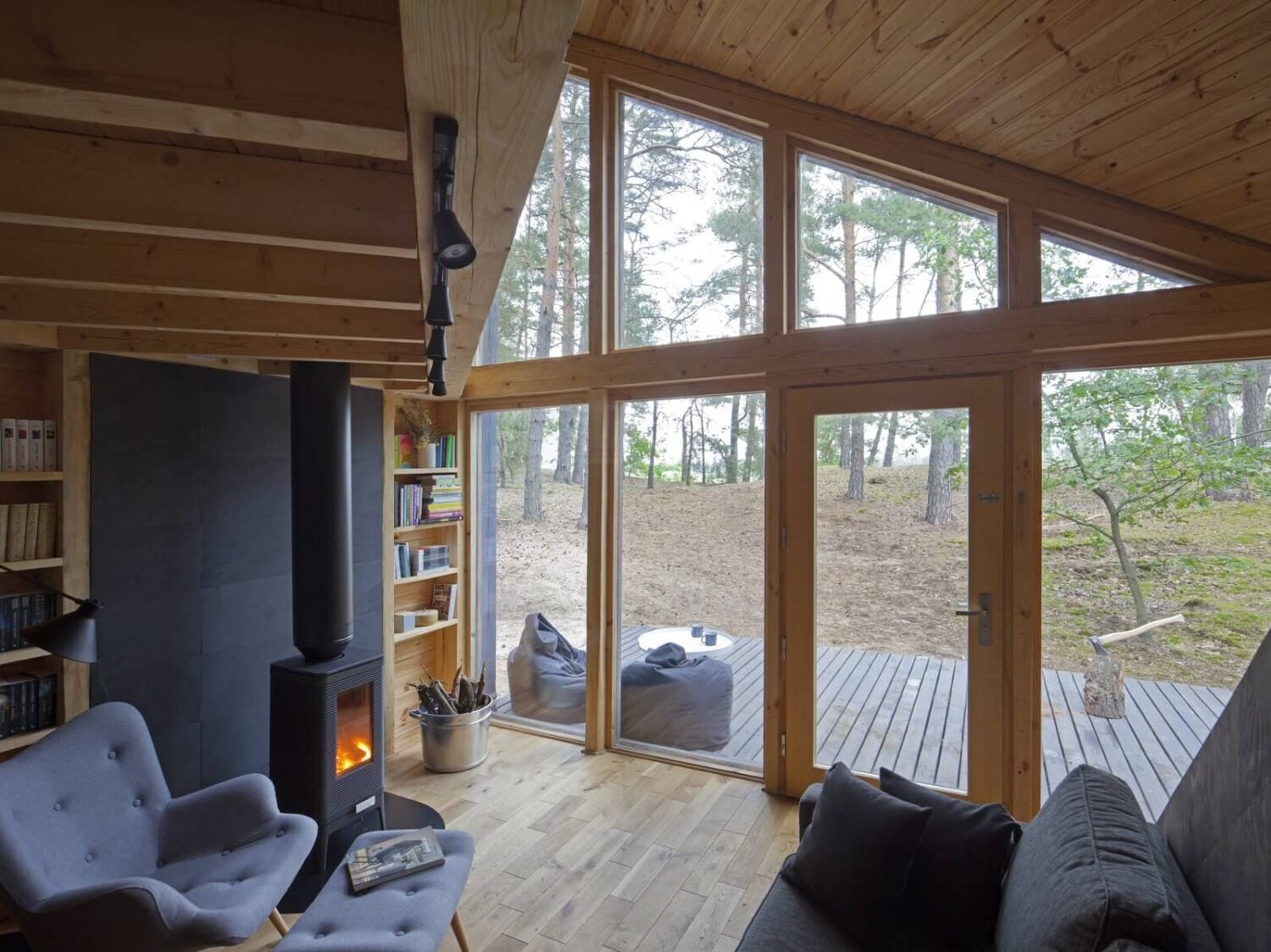The Bookworm Cabin in Poland 2 16-feet-high-windows-cabin-poland-nordroom