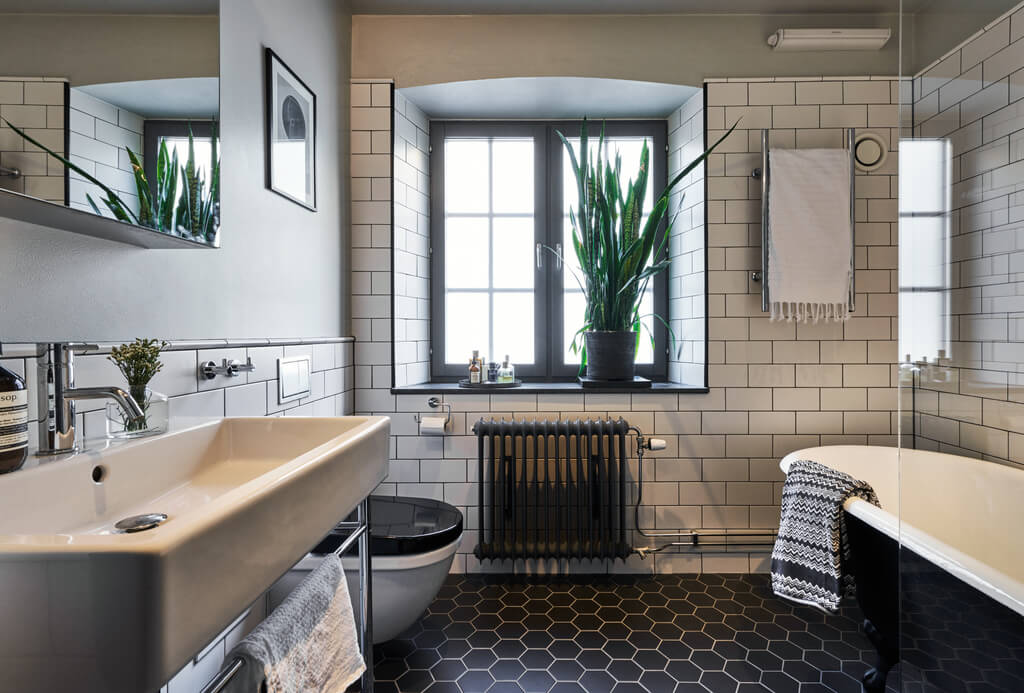 A Swedish Townhouse with Industrial Details 12 bathroom-black-hexagon-tiles-white-subway-tiles-nordroom