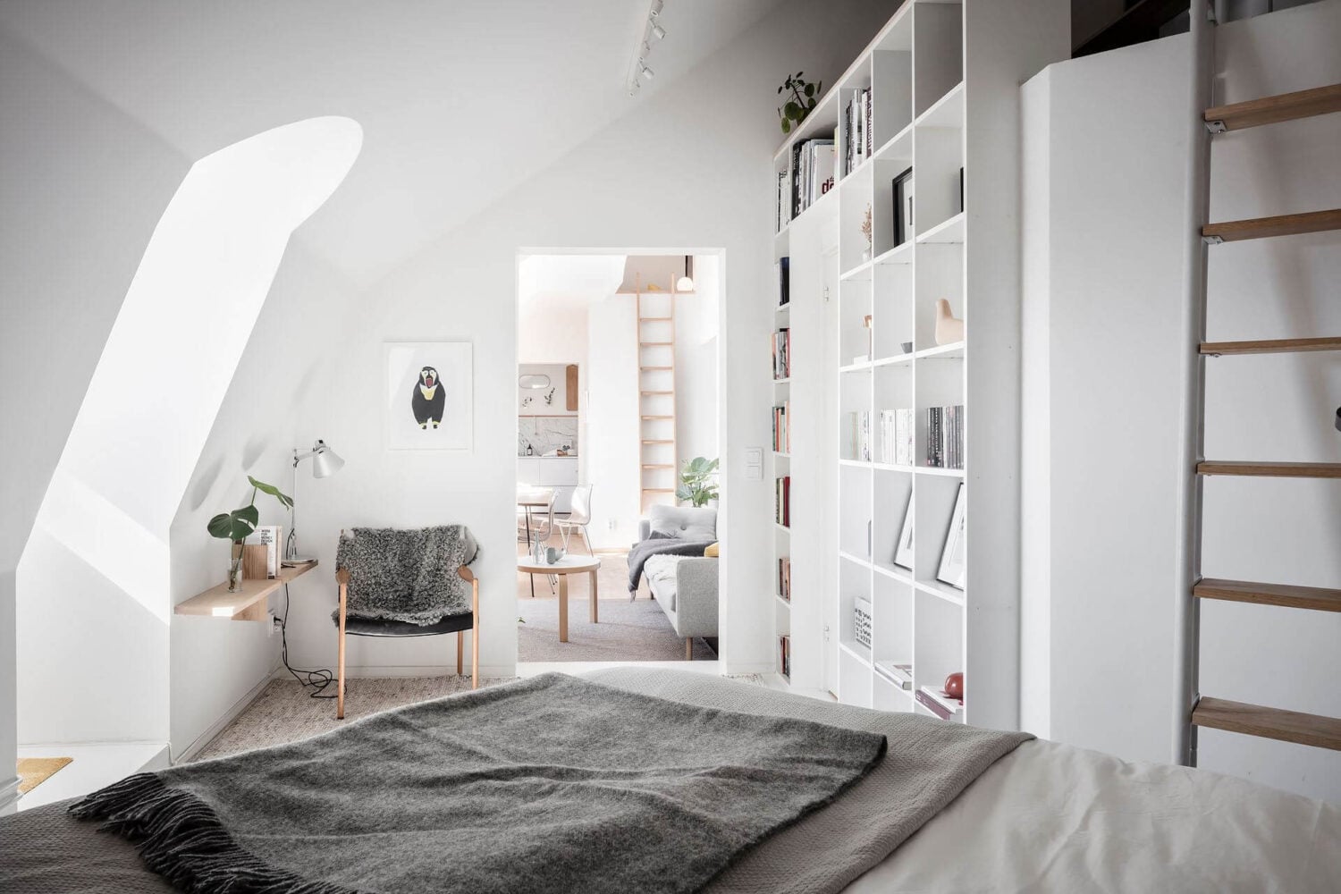 Window Seats & Creative Ideas in a Light Attic Apartment 18 bedroom-loft-home-office-slanted-ceilings-nordroom