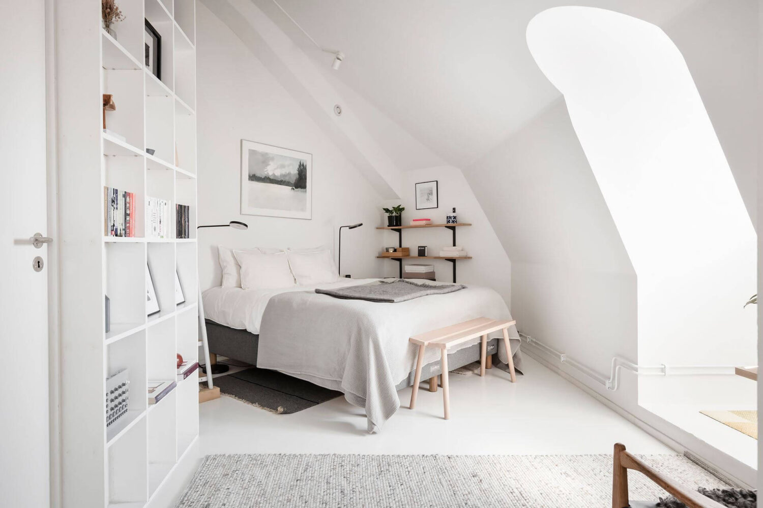 Window Seats & Creative Ideas in a Light Attic Apartment 13 bedroom-slanted-ceilings-nordroom