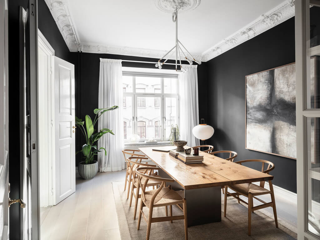 A Black Dining Room in a Stylish Apartment 2 black-scandinavian-dining-room-nordroom