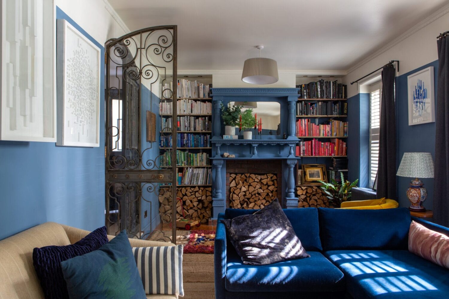 A Colorful Georgian Home in England 5 blue-living-room-fireplace-bookshelves-nordroom