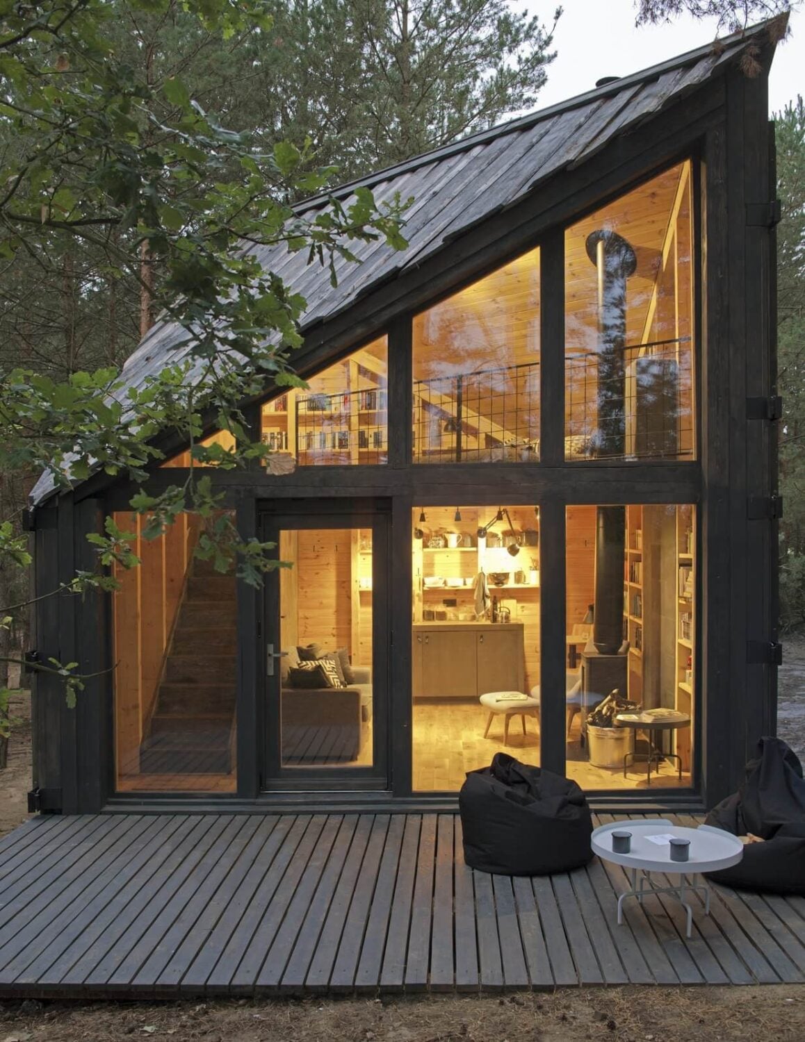 The Bookworm Cabin in Poland 12 cabin-exterior-floor-to-ceiling-windows-nordroom