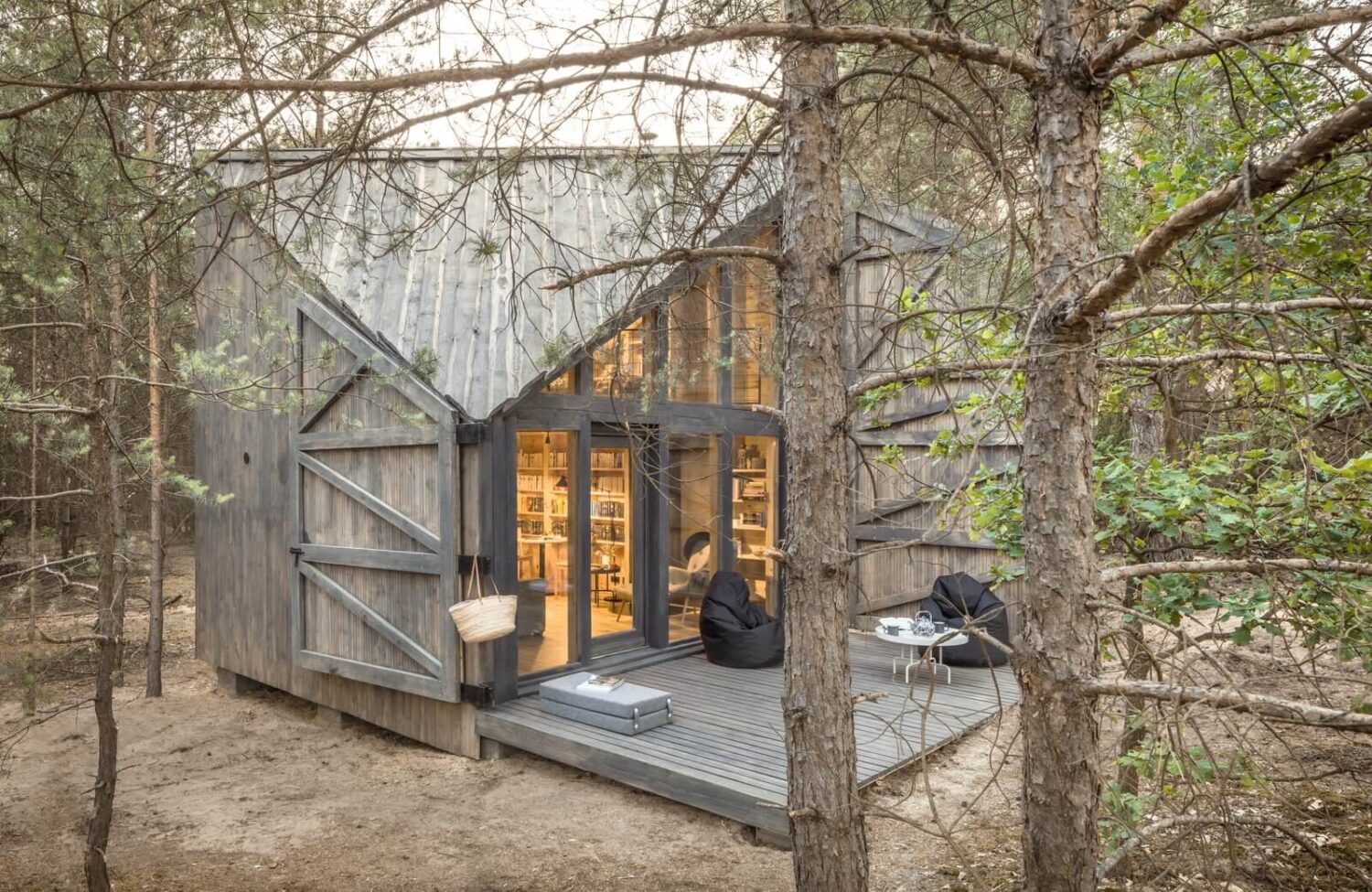 The Bookworm Cabin in Poland 10 cabin-pine-shutters-nordroom