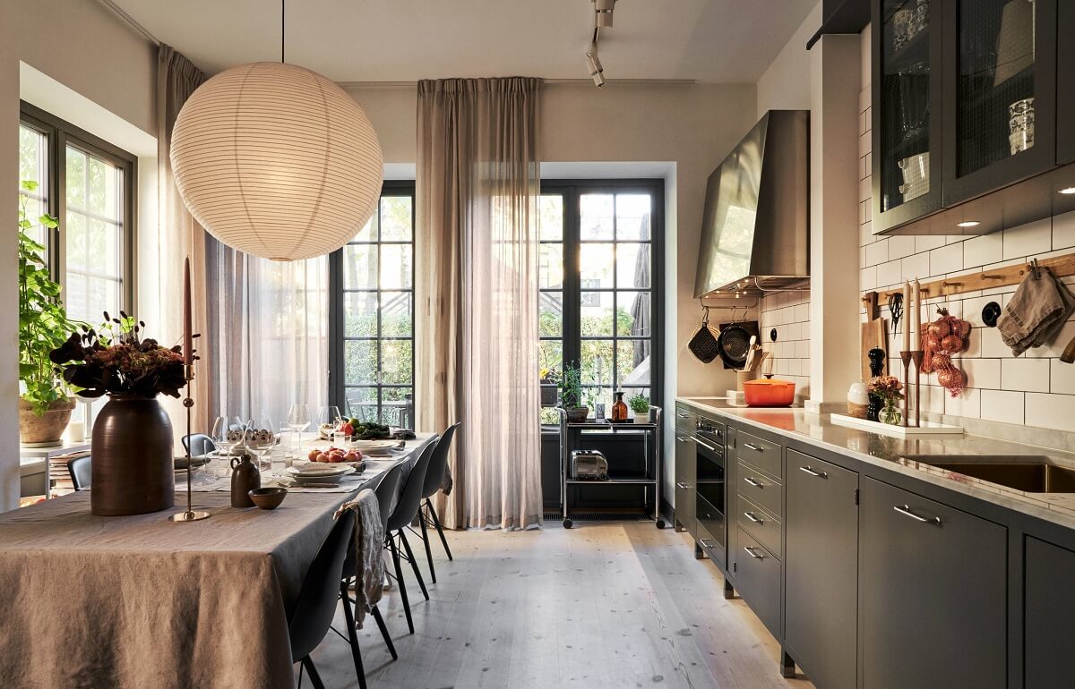 A Swedish Townhouse with Industrial Details 1 dark-grey-kitchen-dining-space-natural-light-industrial-scandinavian-home-nordroom