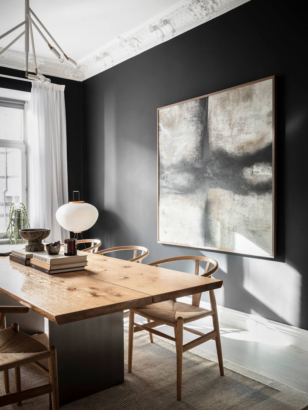 A Black Dining Room in a Stylish Apartment 1 dining-room-black-walls-nordroom