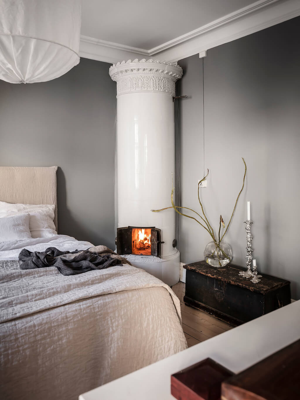 A Stylish Gray Scandinavian Apartment 12 gray-bedroom-fireplace-scandinavian-home-nordroom