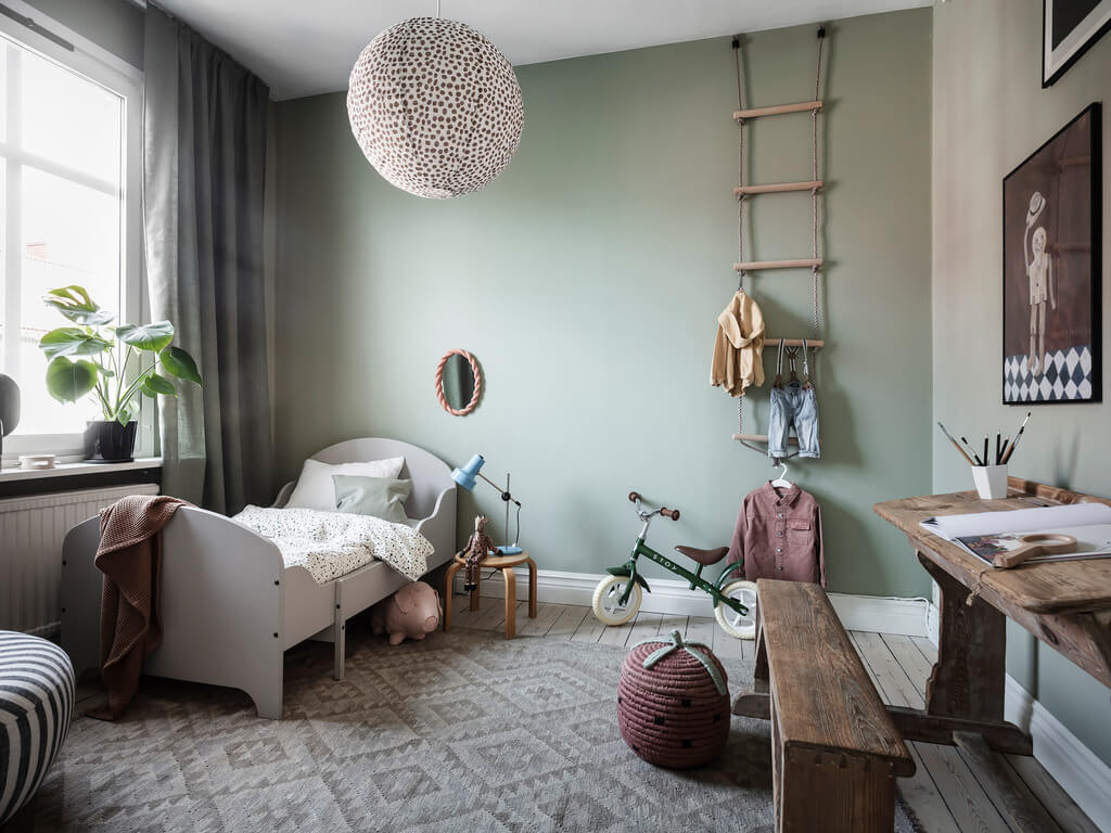 Subtle Color Touches in a Light Apartment 15 green-kids-bedroom-nordroom