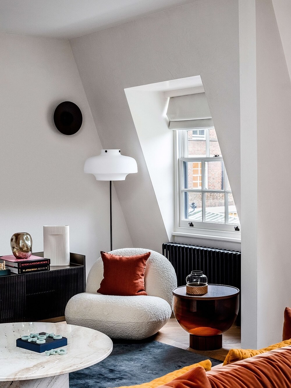 A Modern Playful Mews House in London 8 gubi-pacha-lounge-chair-living-room-nordroom