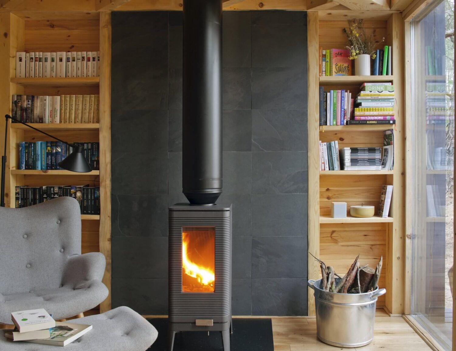The Bookworm Cabin in Poland 4 iwaki-cast-iron-wood-stove-by-invicta-cabin-poland-nordroom