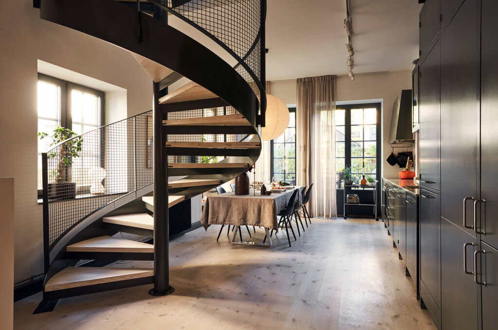A Swedish Townhouse with Industrial Details 2 kitchen-dining-space-spiral-staircase-scandinavian-design-nordroom