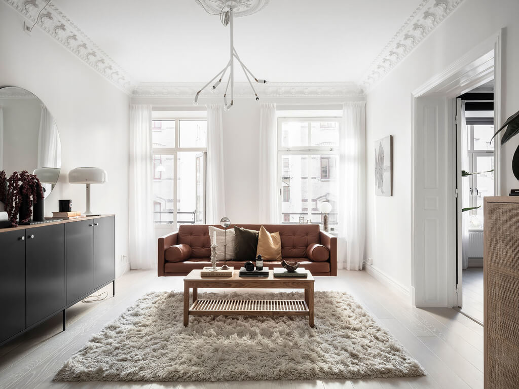A Black Dining Room in a Stylish Apartment 6 leather-sofa-living-room-nordroom