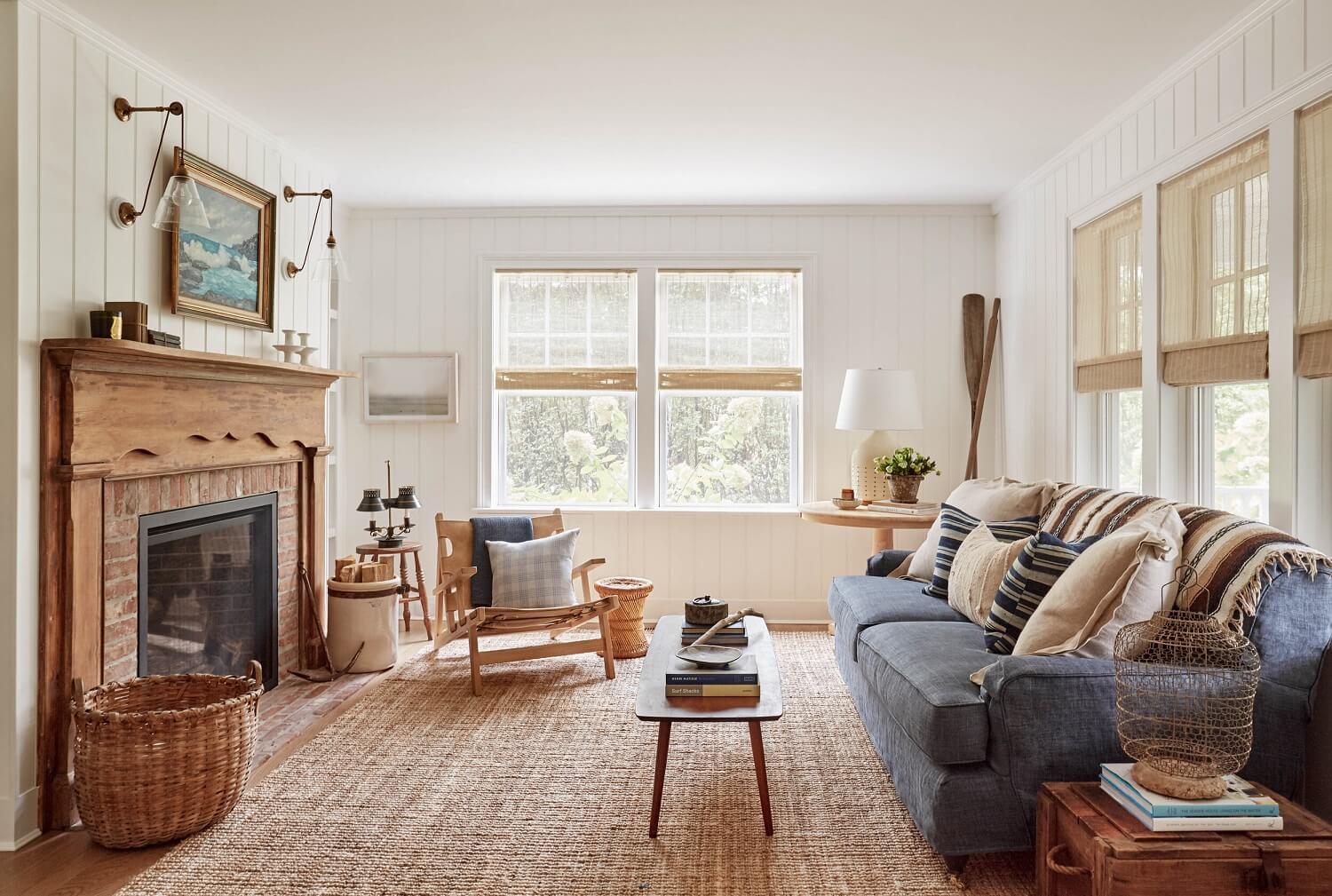 A Serene Surf Retreat in The Hamptons 10 living-room-blue-sofa-jute-rug-fireplace-surf-retreat-becca-interiors-nordroom