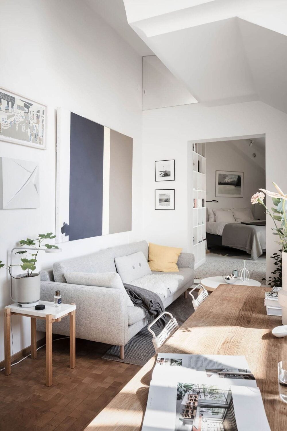 Window Seats & Creative Ideas in a Light Attic Apartment 2 living-room-slanted-ceilings-nordroom