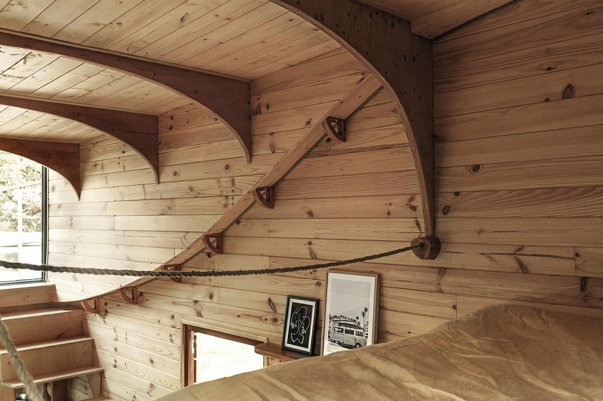 Curved Lines in a Wooden Tiny House 11 loft-bedroom-tiny-house-p'tit-nid-mobile-nordroom